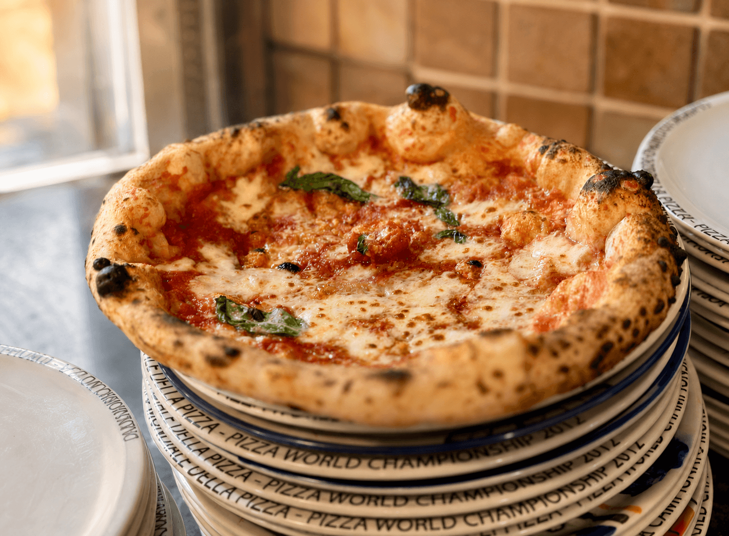 A Margherita STG with charred cornicione at La Leggenda